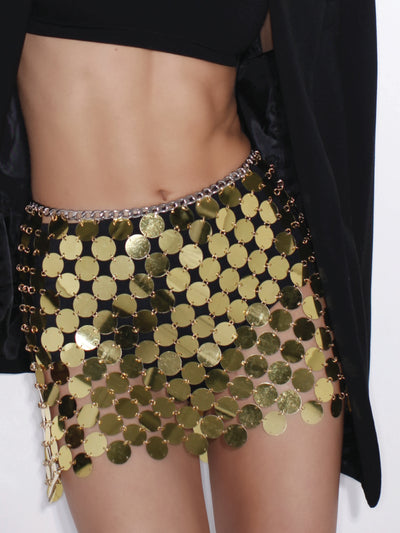 A gold-colored disco mini skirt that is made entirely of discs of round sequins connected by metal links, this is a head-turning piece, which will upgrade any look in a mesmerizing and highly glam style. The skirt comes in one adjustable size with a chain and closure for extension S-M suitable in the size range of sequin beads