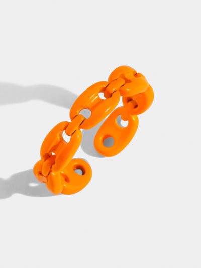 Neon orange chain ring with adjustable fit. Made of stained steel. This ring is thin and delicate.