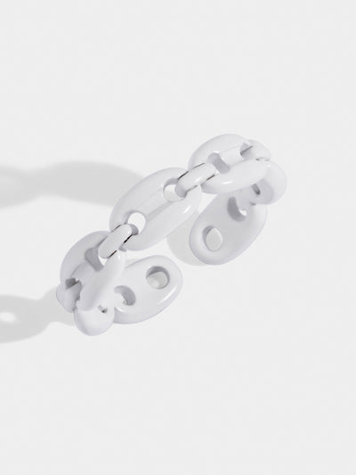 White chain ring with adjustable fit. Made of stained steel. This ring is thin and delicate.