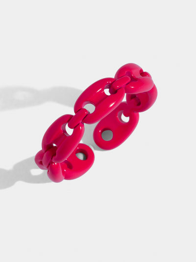 Neon pink chain ring with adjustable fit. Made of stained steel. This ring is thin and delicate.