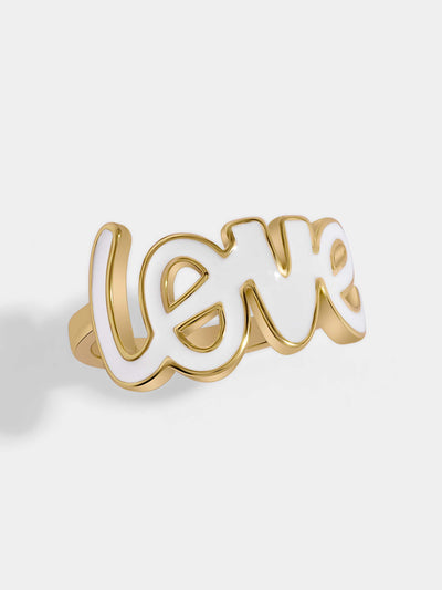 Gold-plated ring with white LOVE letters. Adjustable to fit any size. You will love this ring.