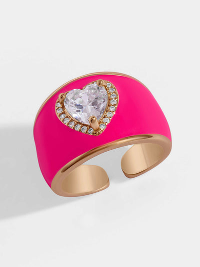 Neon pink ring with emerald zircon in the shape of a heart. Made with gold plating and crystals. Fill your life with colors!