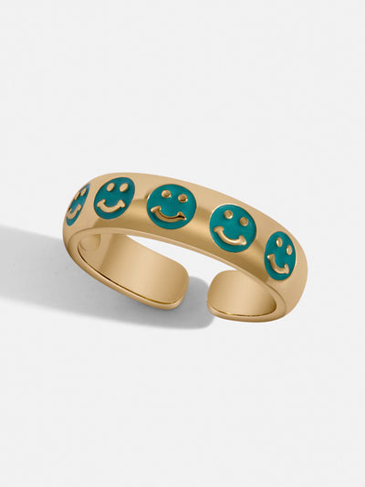 Gold pave ring with five tiny smiley face turquoise colored. A delicate touch to your hands and a friendly reminder to be happy.