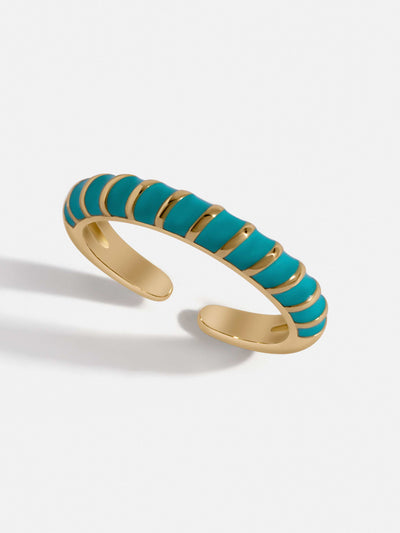 Delicate gold paved ring with turquoise and gold spirals. Adjustable for all fit.