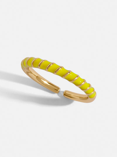 Delicate gold paved ring with neon yellow and gold spirals. Adjustable for all fit.