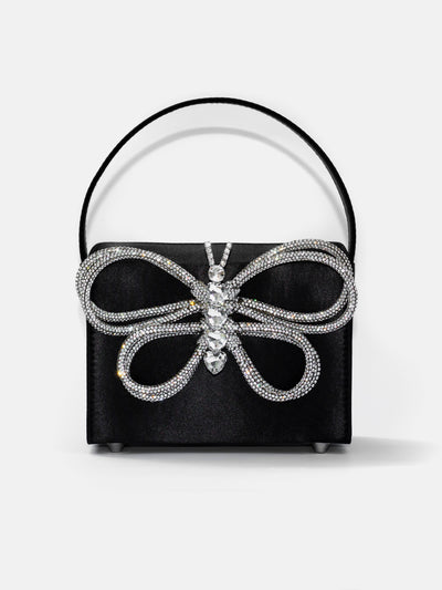 This is love at first sight? Yes, it is and we love it too. Our mariposa bag made with crystals on black satin fabric is the cutest accessory that you're going to see today. Go dating, hang out with friends or go shopping, glam goes with you.